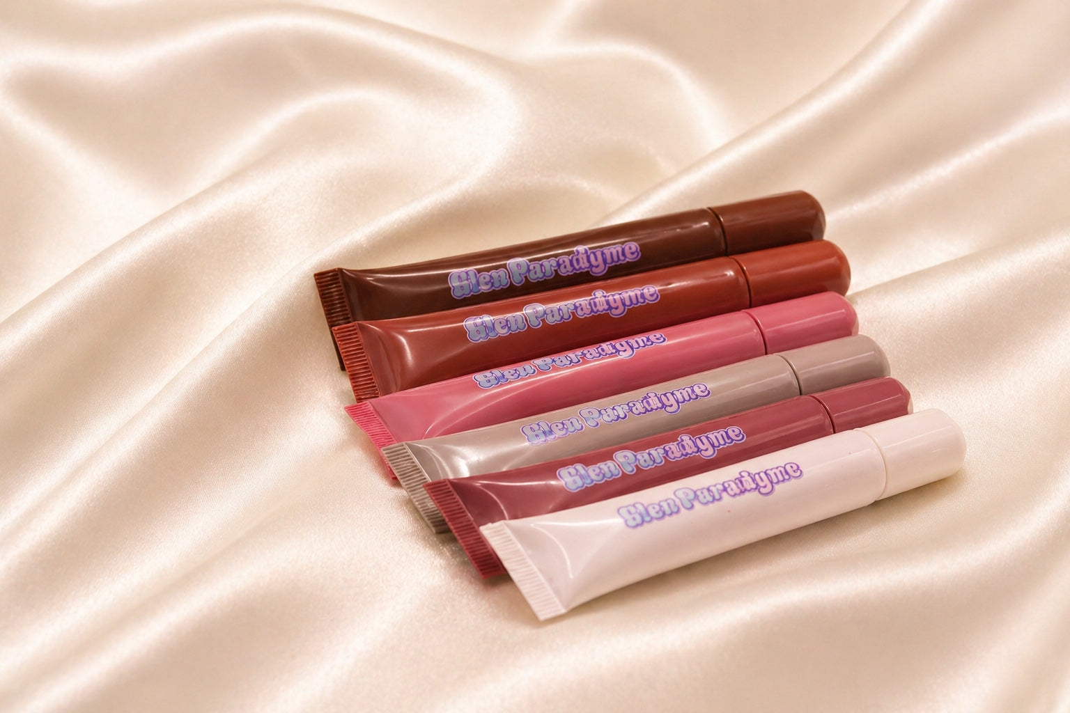 Bleu Paradyme squeeze tube glosses